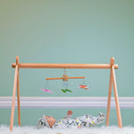 hanging toy set! Three charming mobiles, each showcasing unique textures, sounds, and vibrant colors, dangle playfully above, captivating tiny minds and encouraging reaching and grasping. This set is perfect for attaching to car seats, strollers, or play gyms, providing on-the-go entertainment for your precious little one. Watch as they discover the crinkly fabrics, jingle bells, and cuddly characters, their smiles filled with wonder and delight.