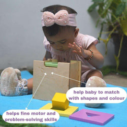 Playing with first shape puzzle and shape cards help baby to match with shapes and colours