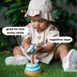 Wooden Stacker is good for fine motor skills and cognitive input in babies